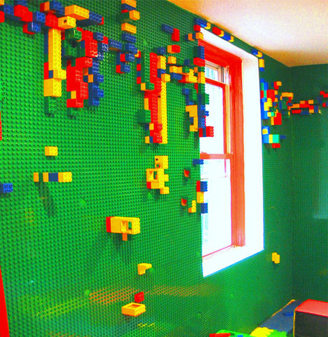 house with legos in the walls