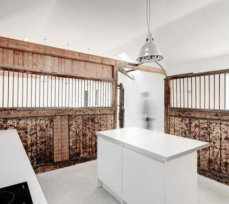 Wood Contrasts With White In Converted Stable House