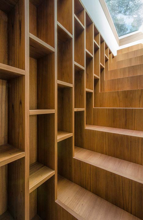 stairs extending from bookcase