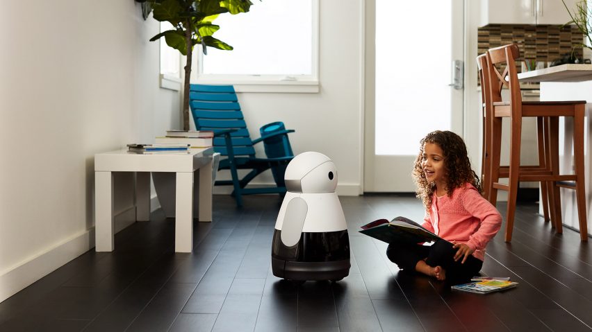 kuri home robot and child