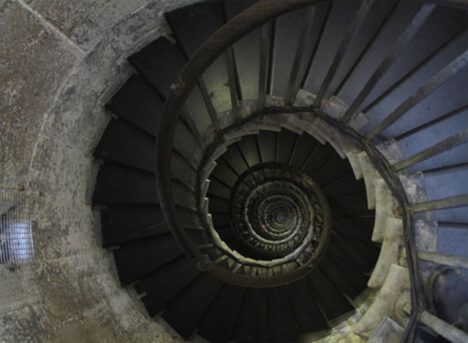 Metal and stone spiral staircase