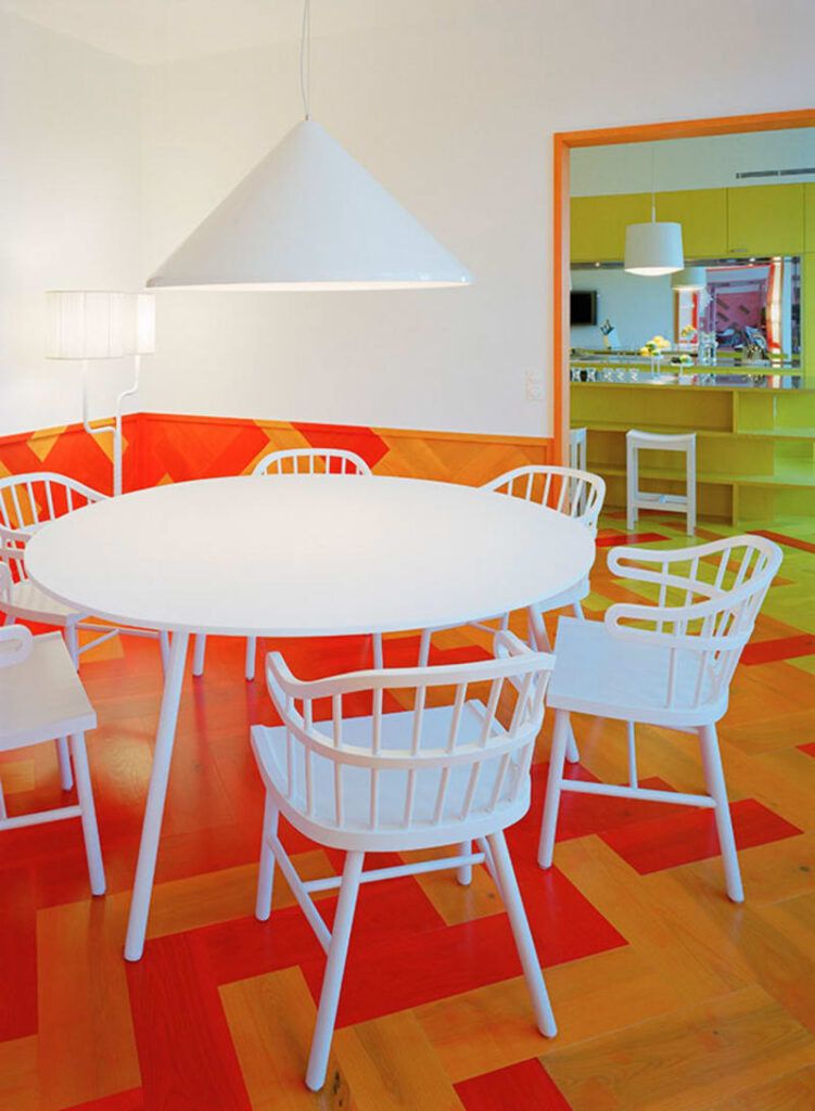 Colorful apartment parquet dining area