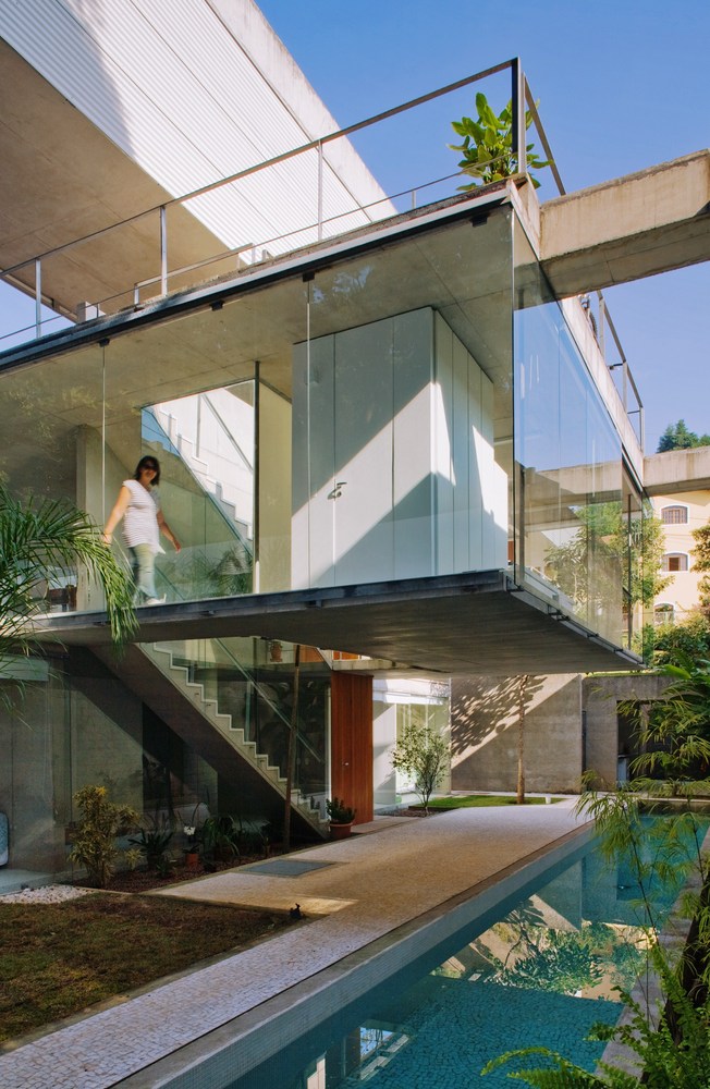 The house floats over a pool below