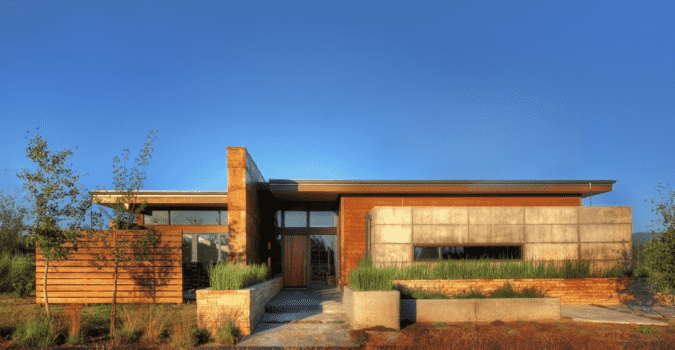 Pique rammed earth home