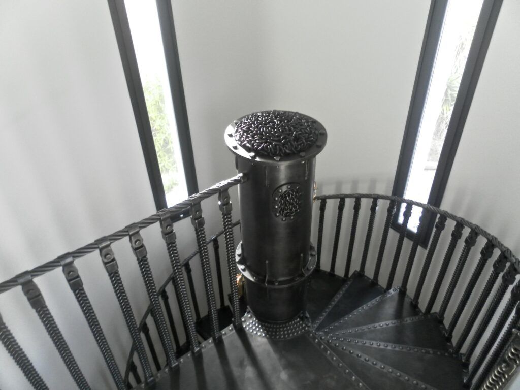 https://dornob.com/wp-content/uploads/2009/09/Stig-chain-spiral-staircase-industrial-metal-1024x768.jpeg