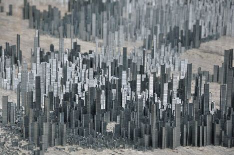 Miniature model city made of staples by Peter Root skyline