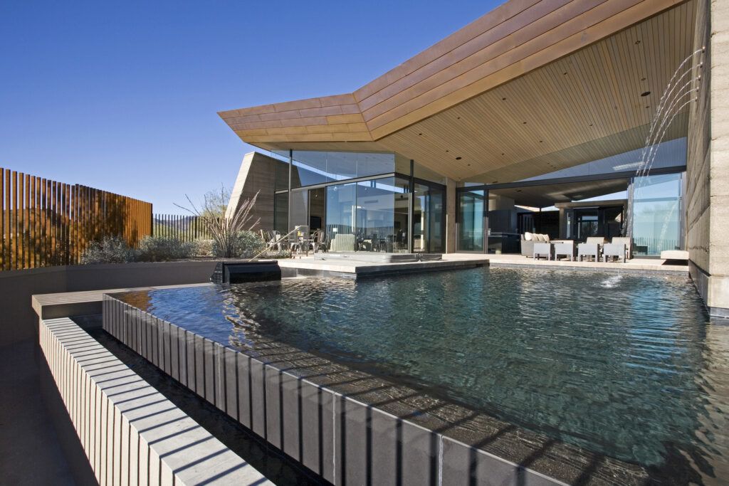 Modern rammed earth house pool