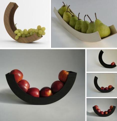 Circular curved metal fruit bowls