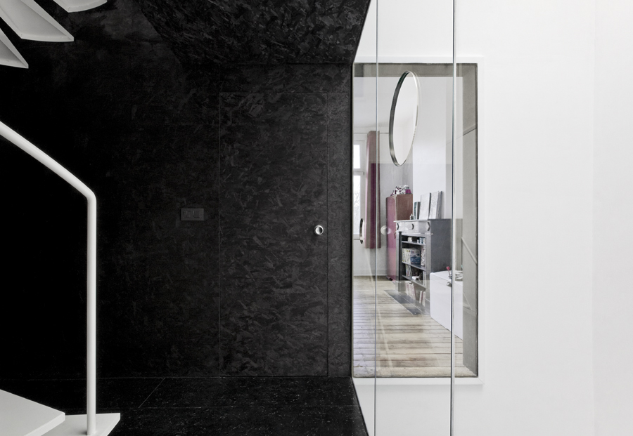 Black and white interior design Fiat Lux stairs and mirror