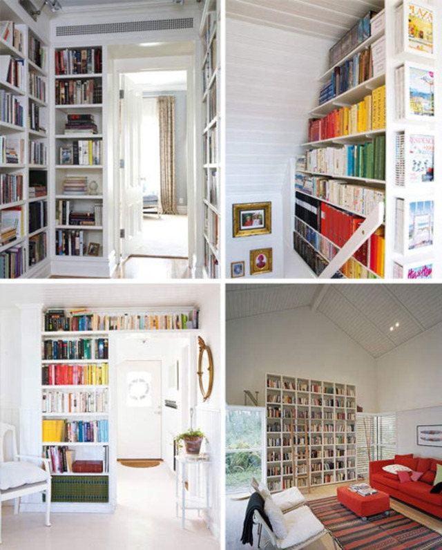 Floor to ceiling white bookcases