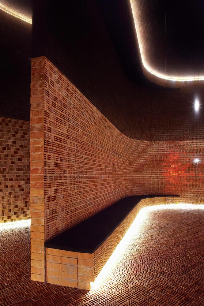 Curving brick wall lights