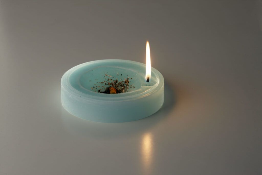 Ash tray candle odor