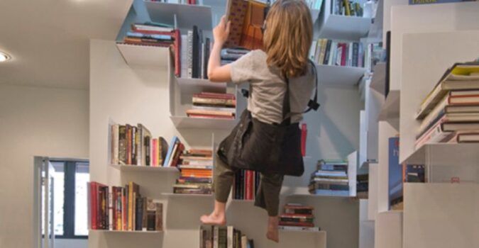 Sallie Trout climbing harness bookshelves