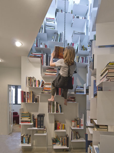 Incredible Home Bookcase Climbs 40 Feet of Interior Walls 