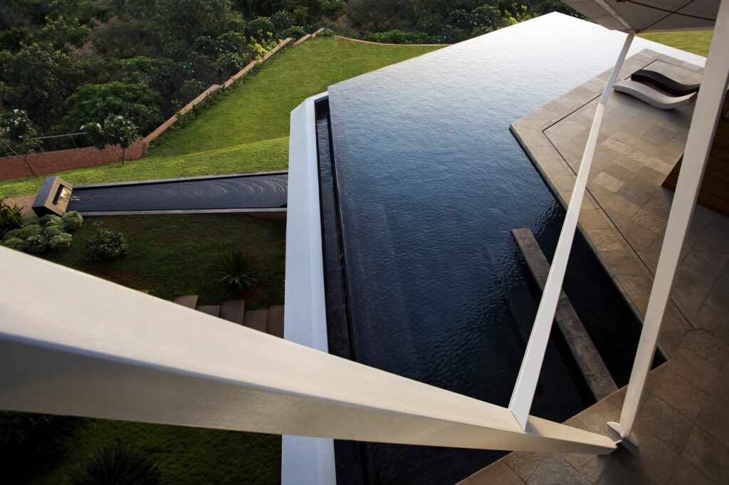 Rooftop Pools Cuboid House at Alibag from above