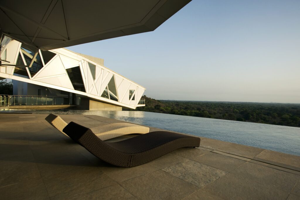 Rooftop Pools Cuboid House at Alibag reflecting