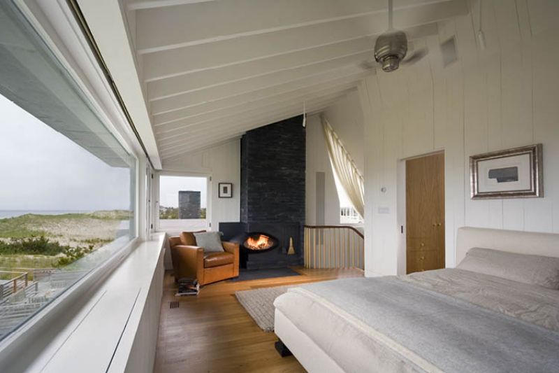 Vacation home with cantilevered loft fireplace
