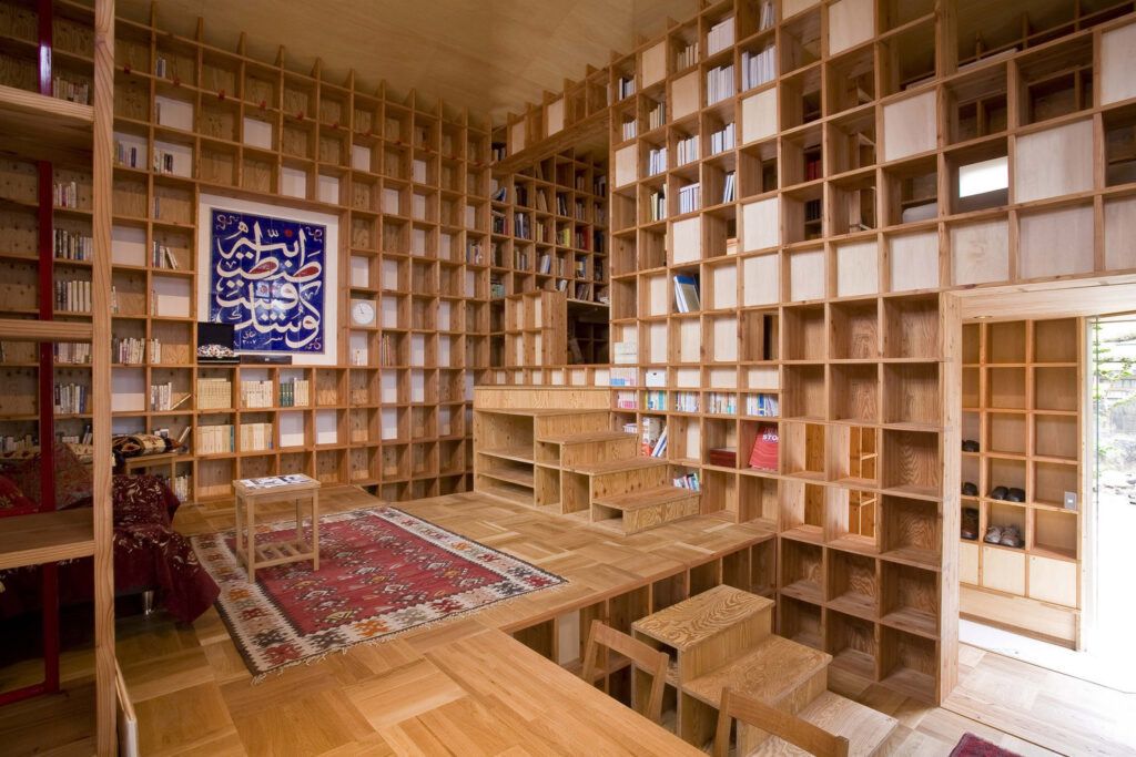 Floor-to-Ceiling Bookshelves at Shelf Pod Home