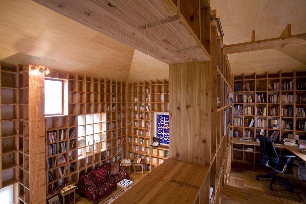 Floor-to-Ceiling Bookshelves at Shelf Pod Home second floor