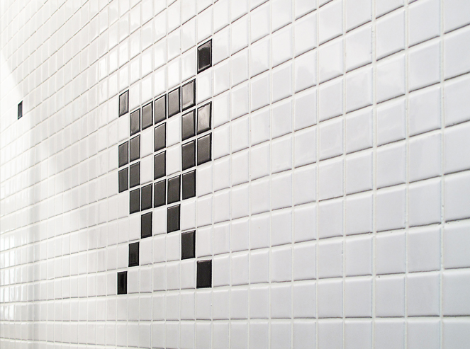 Space invader bathroom tiles close up