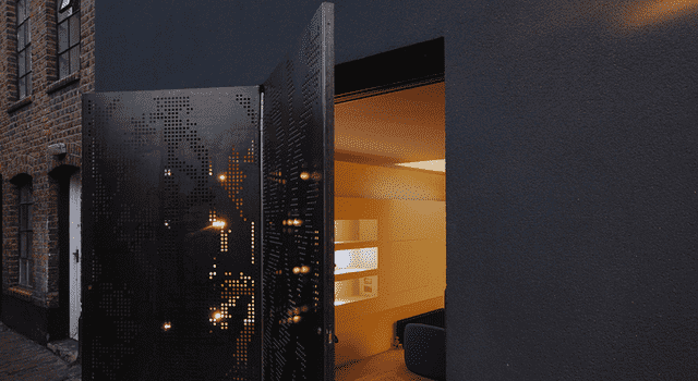 hidden house steel doors open