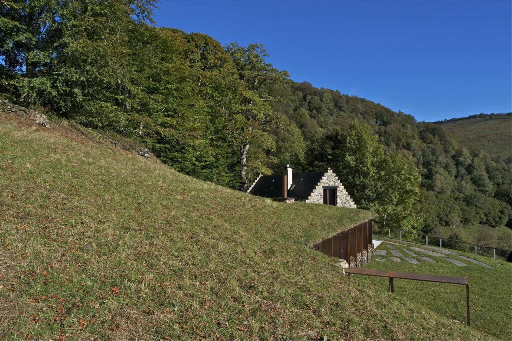 Converted Barn with a Modern Addition green roof