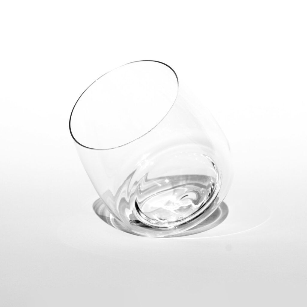 saturn red wine glass leaning