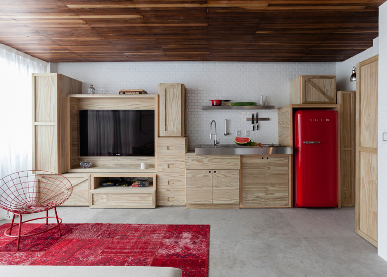 Spacious small apartment in Brazil plywood kitchen
