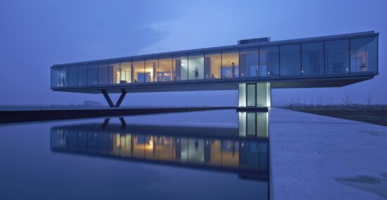 villain's lair with reflecting pool villa kogelhof night