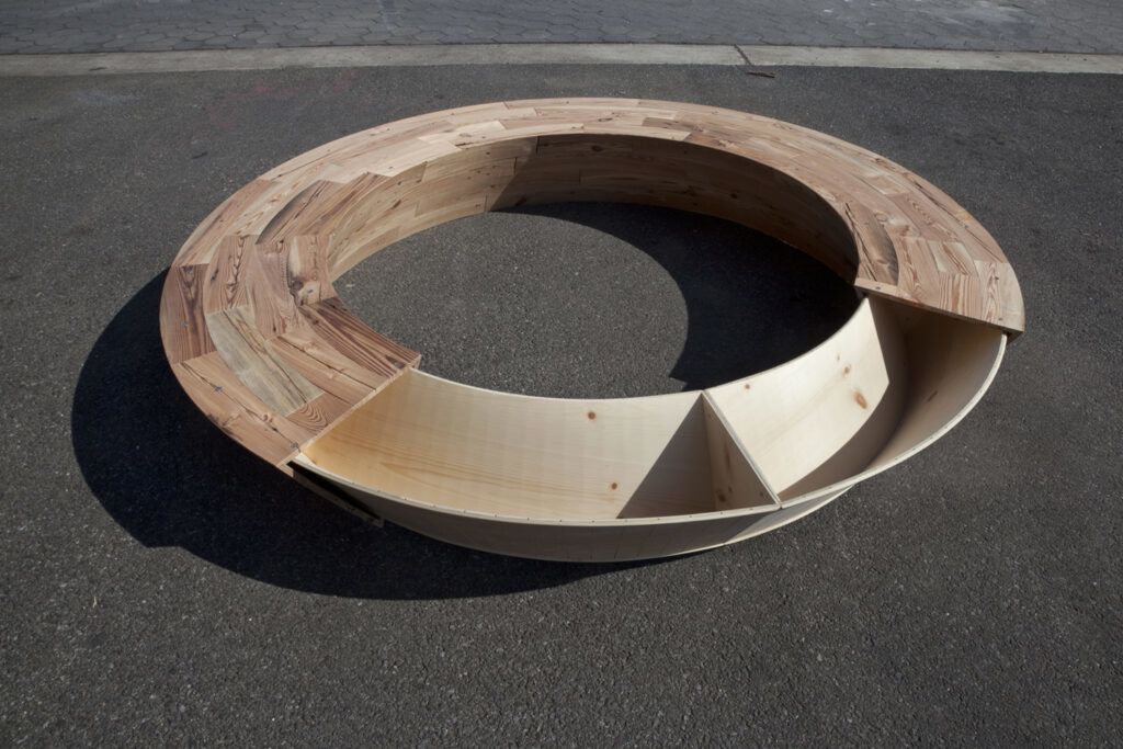 round pine bench becoming a circle