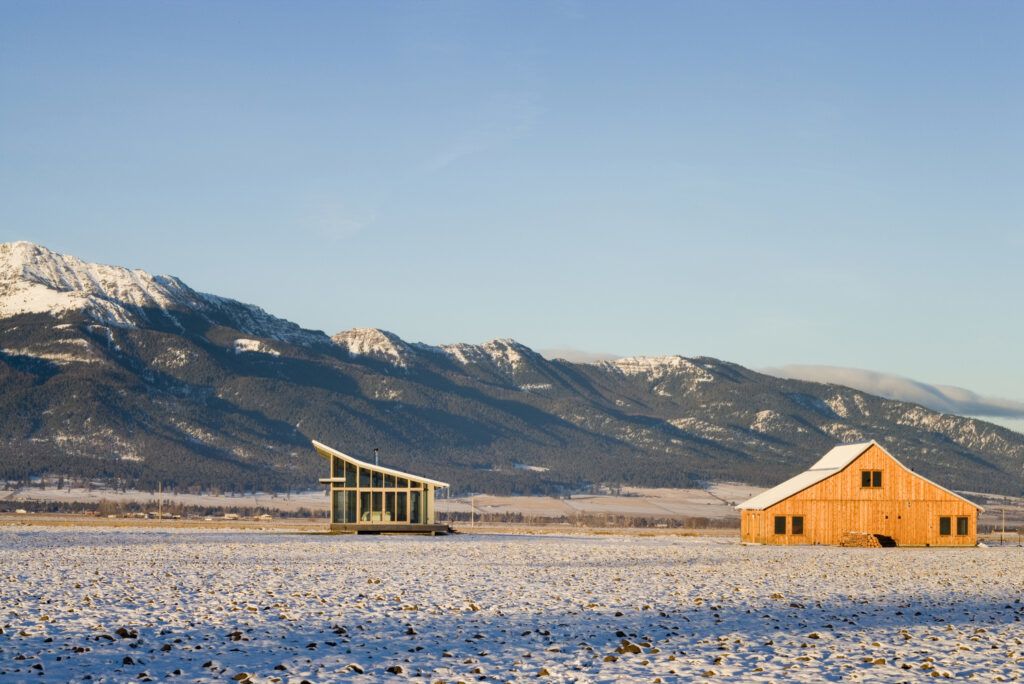 Glass farmhouse mountain backdrop