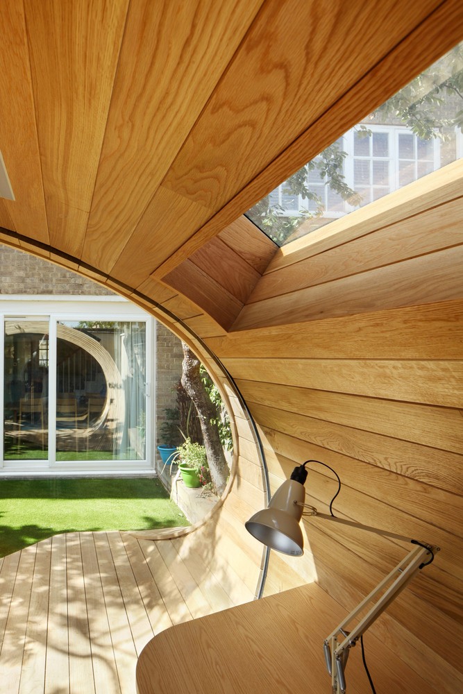 Shoffice shell shaped backyard office interior