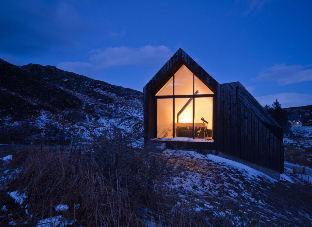 TImber Home in Scotland dusk