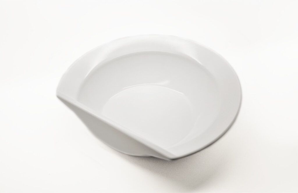 Ceramic scoop bowl for disabled people flat edge