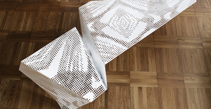 Laser-cut tablecloth table surface