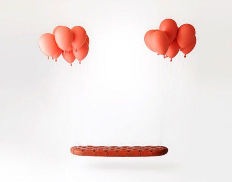 floating on balloons