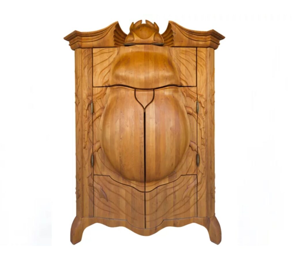 Beetle hand-carved wooden armoire detail Janis Straupe