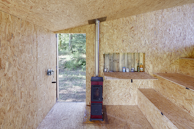 modern forest hut black interior view