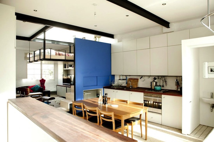 Hanging loft bed in a London apartment kitchen