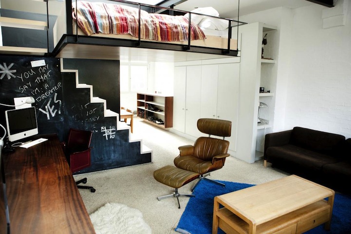Hanging loft bed in a London apartment stairs
