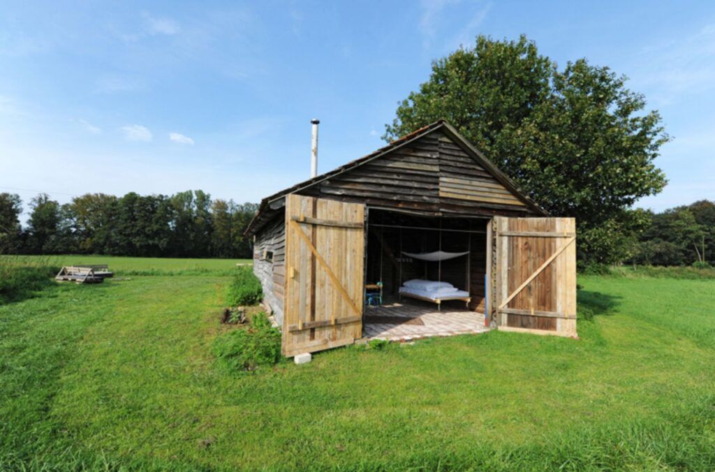 Low cost reclaimed barn residence doors