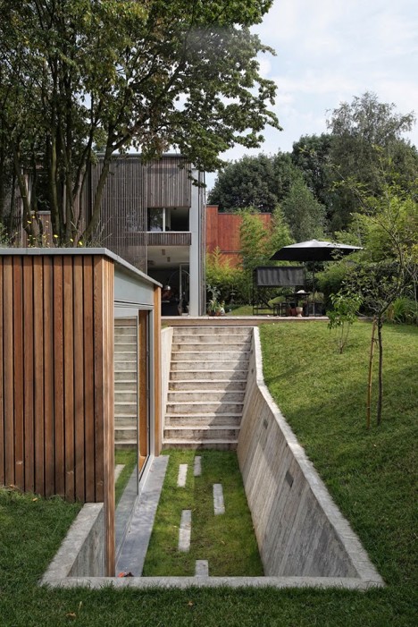 Grassy Getaway Detached Backyard Workshop Hides in Hillside