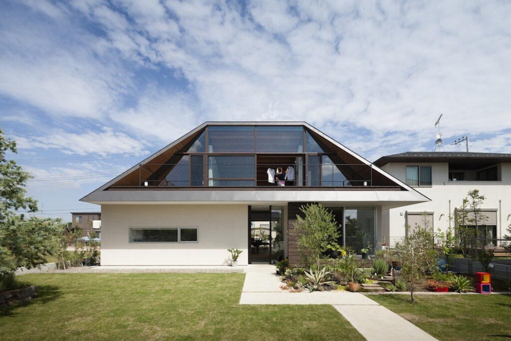 Modern home with hipped roof Japan glass