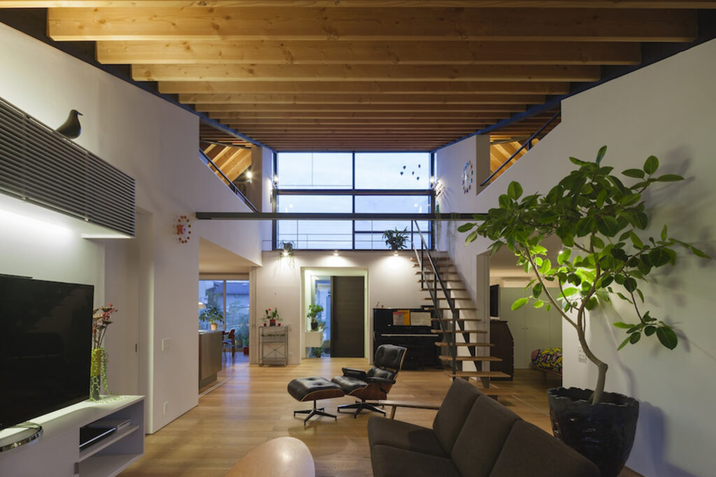 Modern home with hipped roof Japan living room
