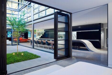 Corben Architects warehouse home glass doors