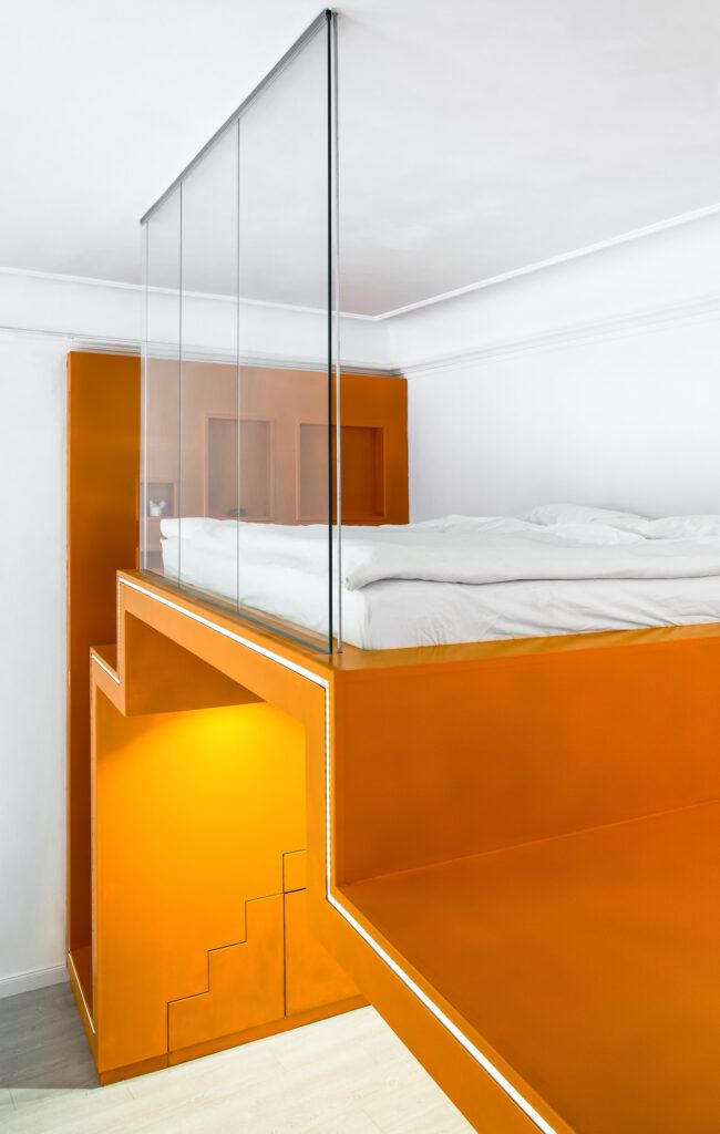 Budapest apartment orange staircase loft bed