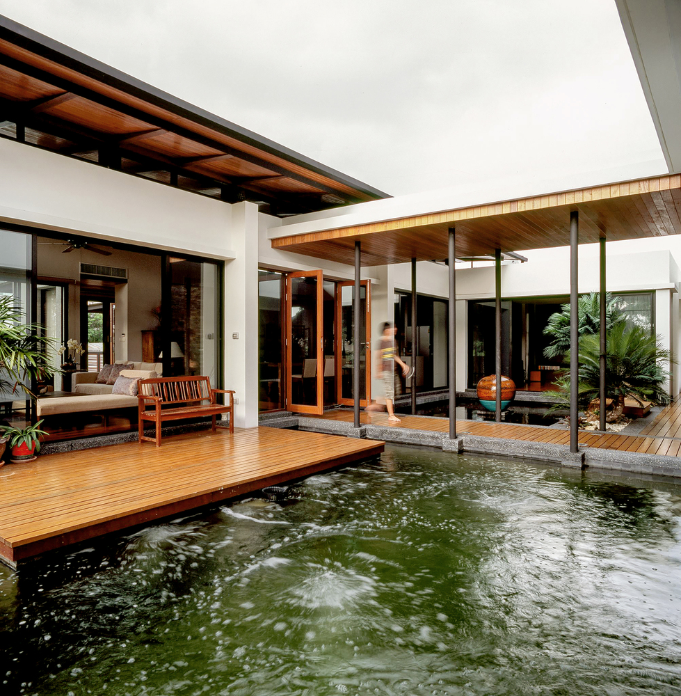 Modern feng shui house with reflecting pools