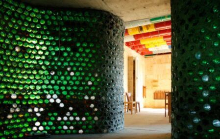 Officina Roma recycled sanctuary bottle walls