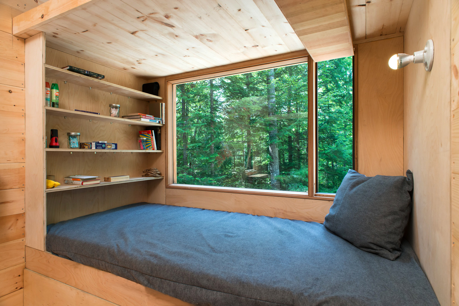tiny house getaway bed nook with window