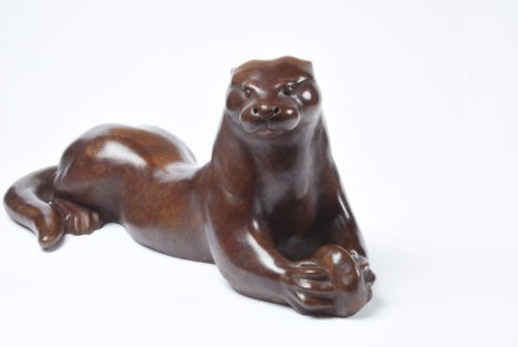 bronze animals otter and stone